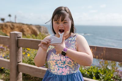 Child with Down syndrome enjoying creative activities